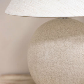 Stone ceramic coolie shade table lamp detail shot of stone texture