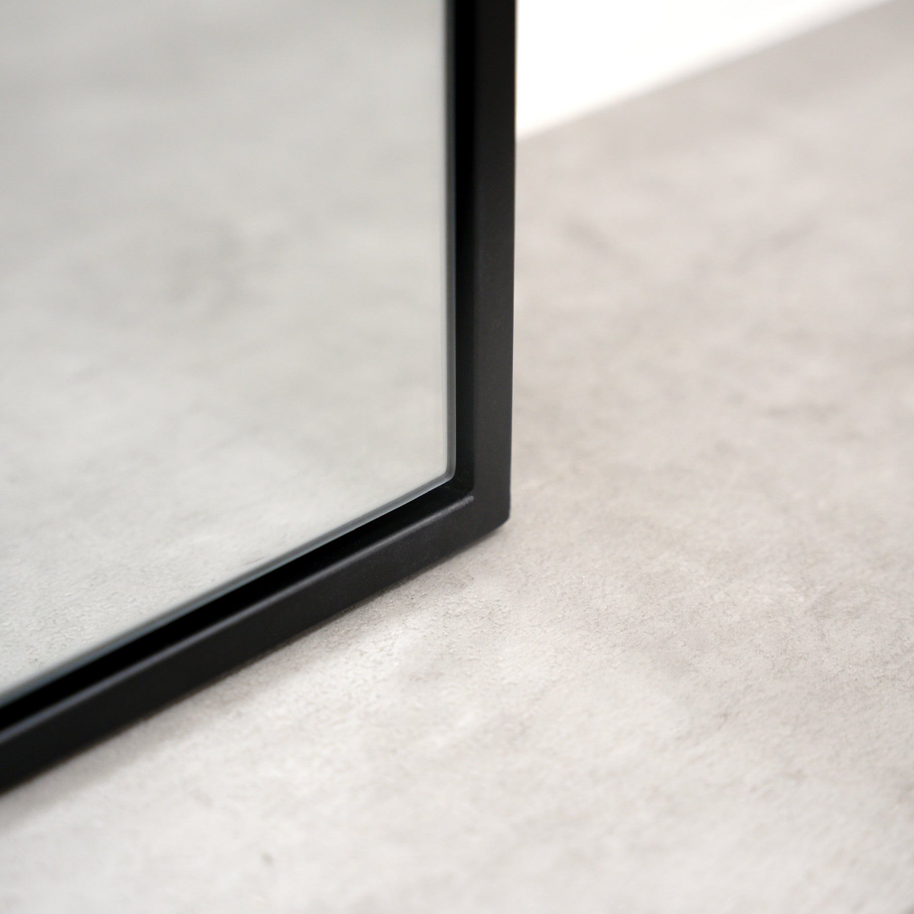 Black Full Length Arched Metal Mirror detail shot of corner