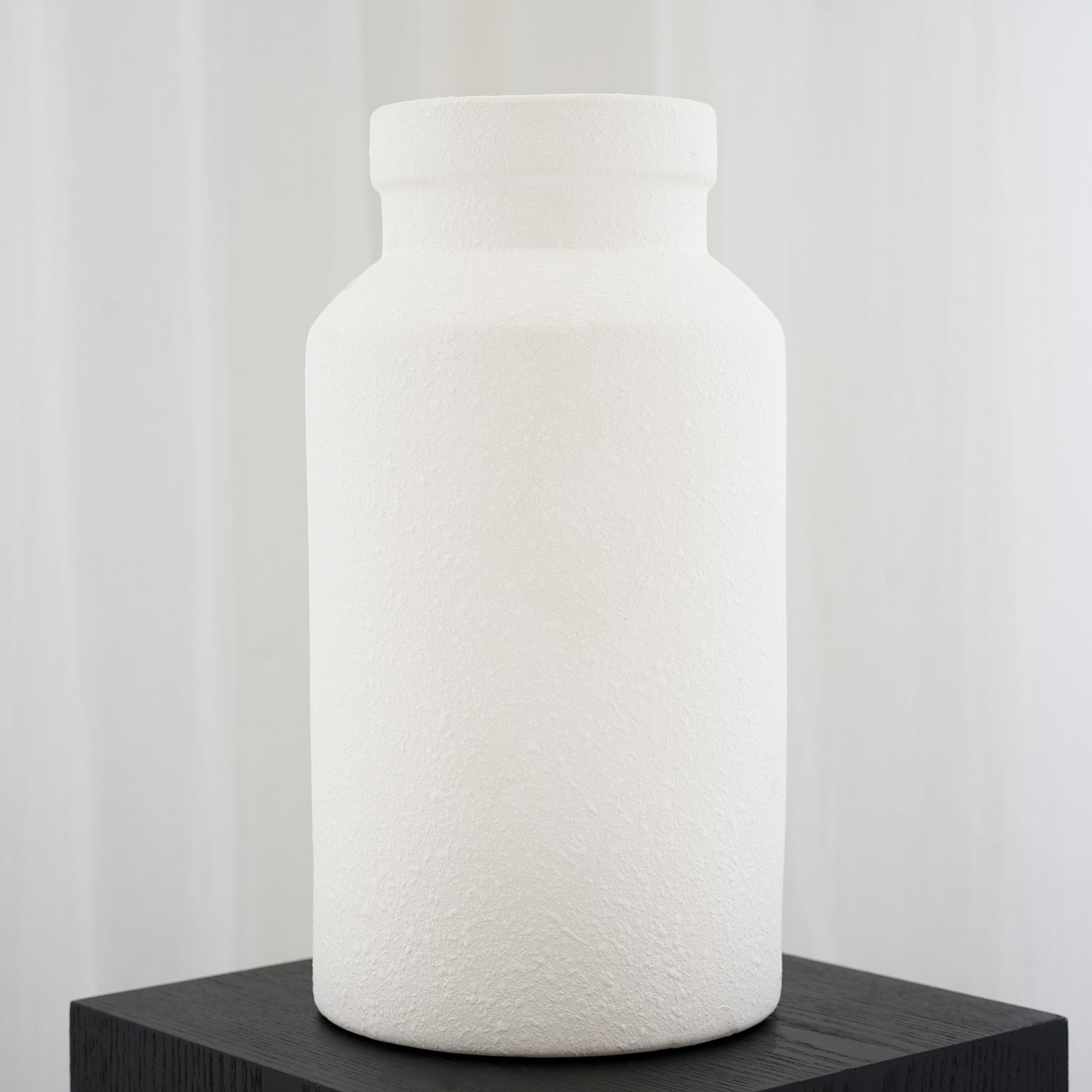 White textured ceramic small vase empty