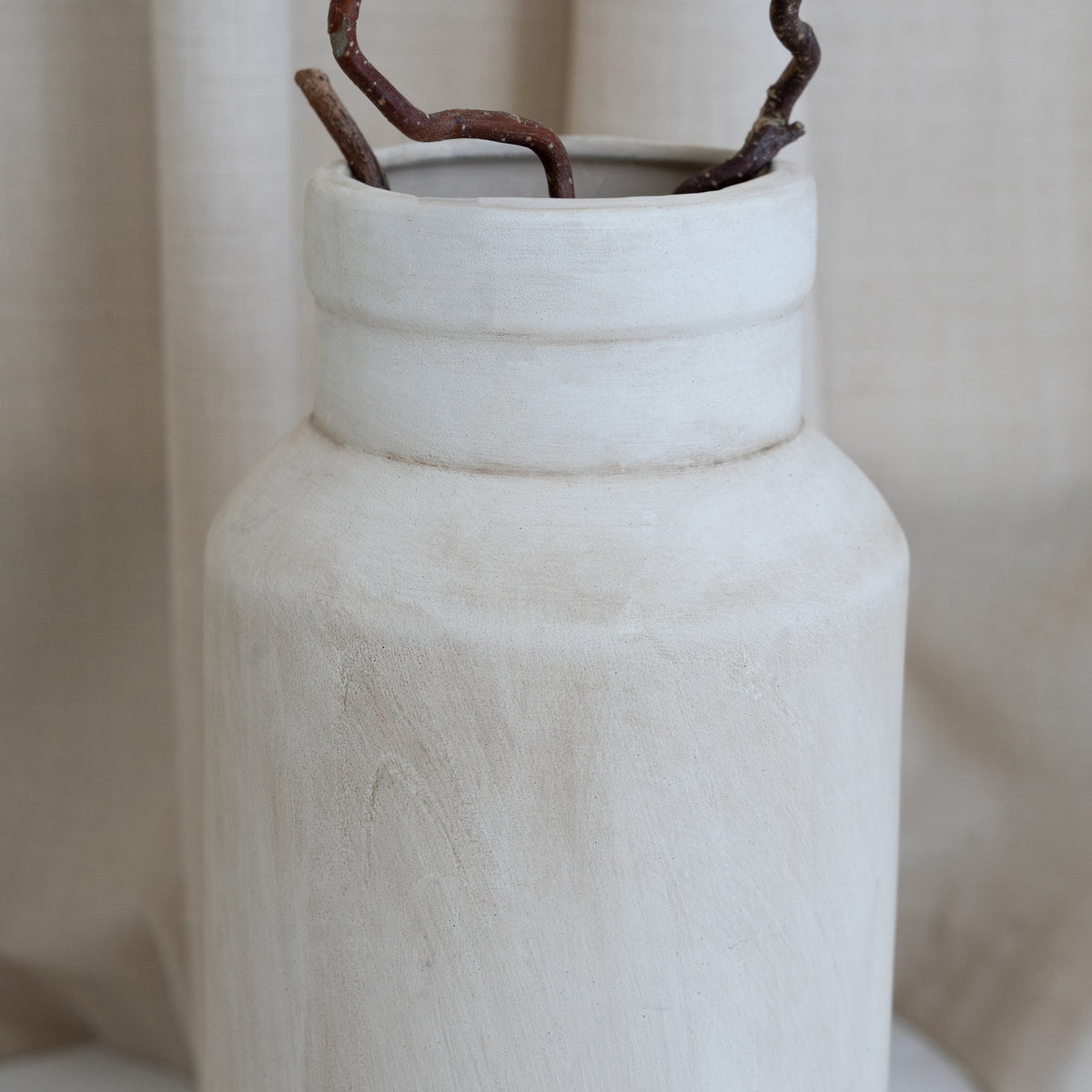 Beige textured ceramic large vase detail shot