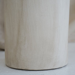 Beige textured ceramic large vase detail shot of base