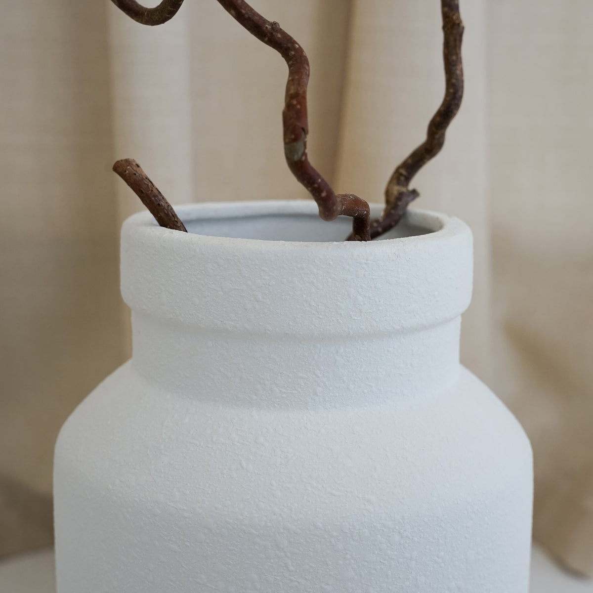 White textured ceramic small vase detail shot