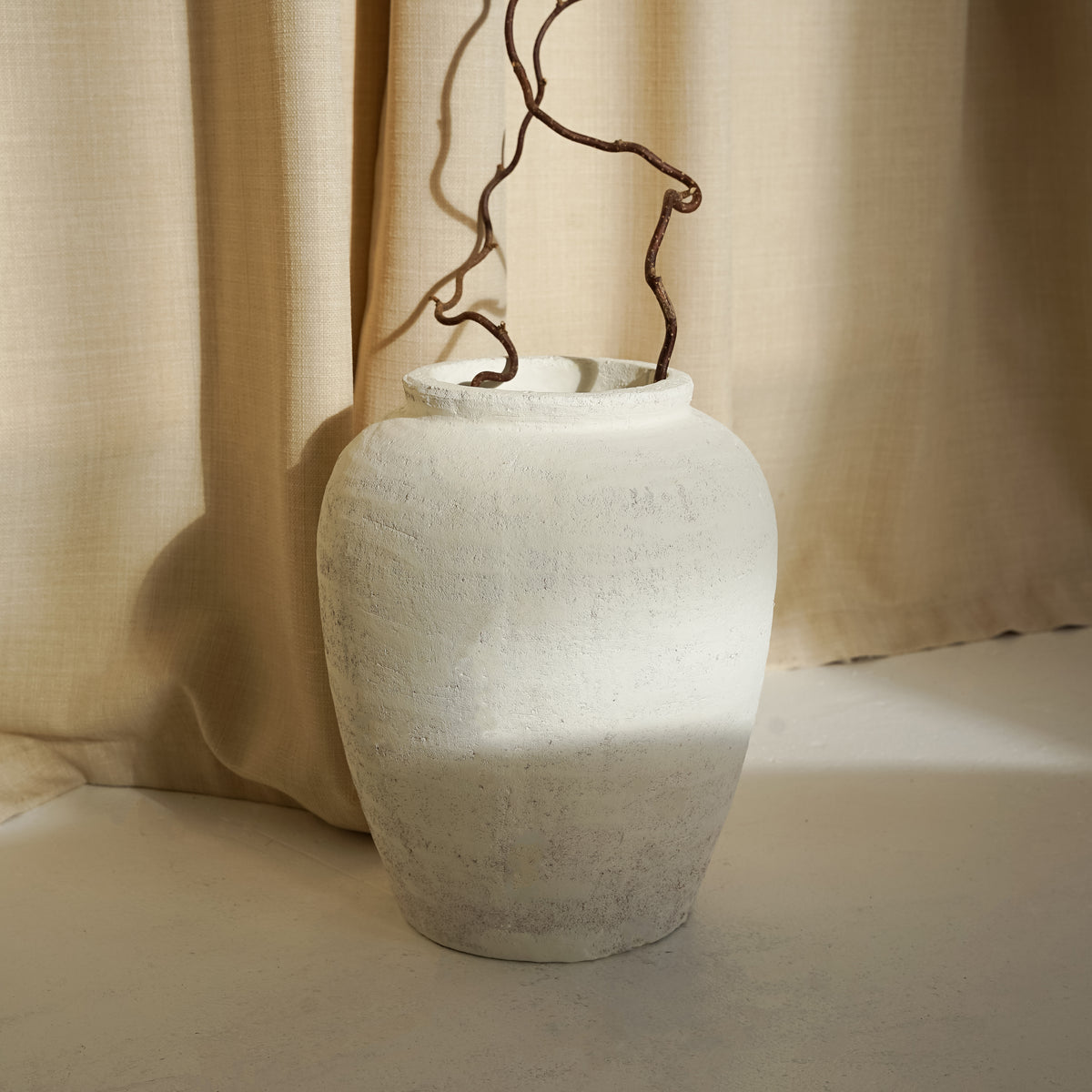 White Textured Terracotta Small Vase in natural sunlight