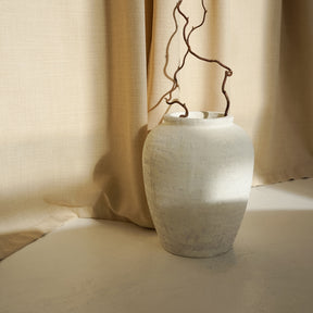 White Textured Terracotta Small Vase with fabric background