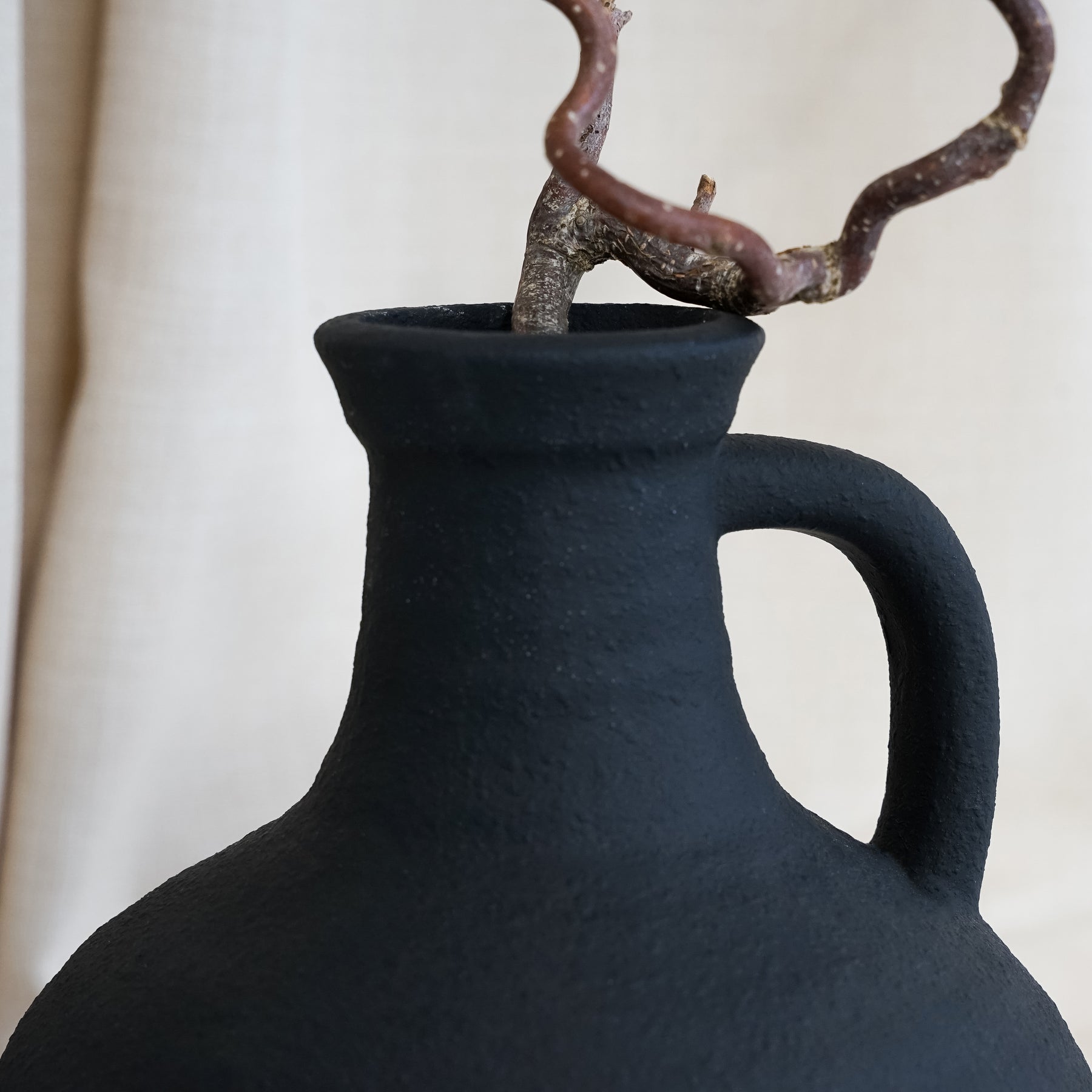 Detail shot of Black Textured Ceramic Small Vase rim