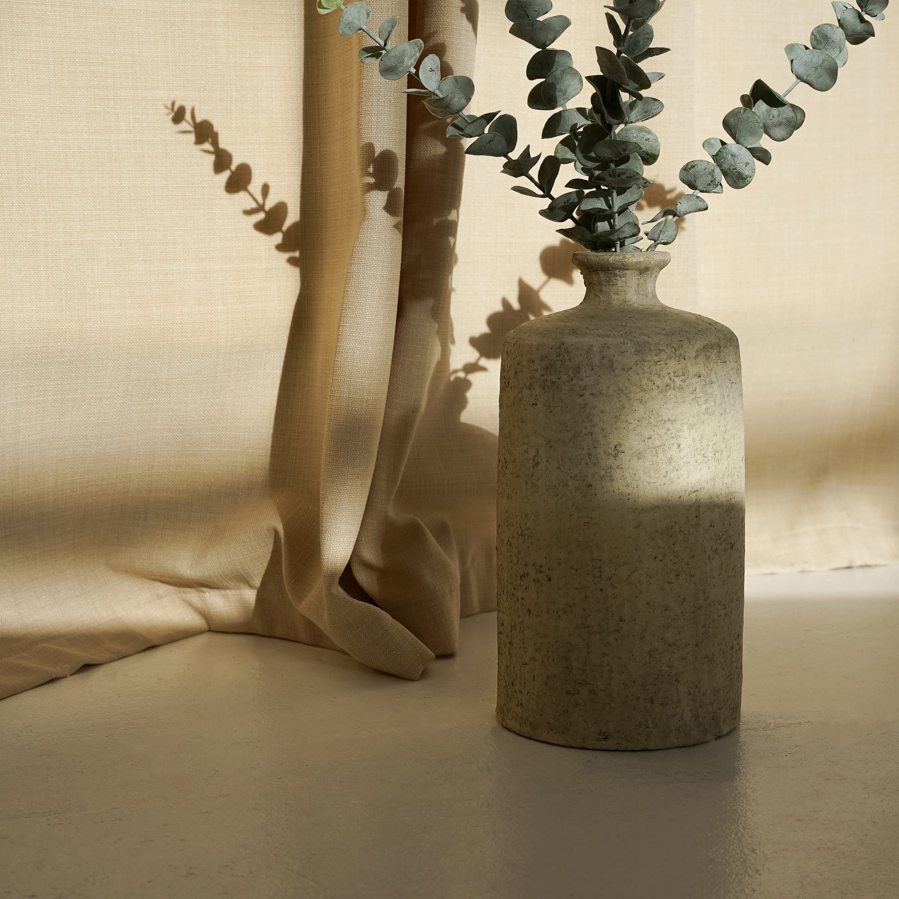 Beige Textured Terracotta Small Vase in natural sunlight