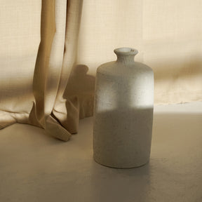 White Textured Terracotta Small Vase in natural sunlight
