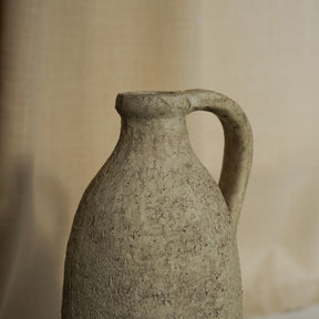 detail shot of Beige Textured Terracotta Small Vase rustic texture