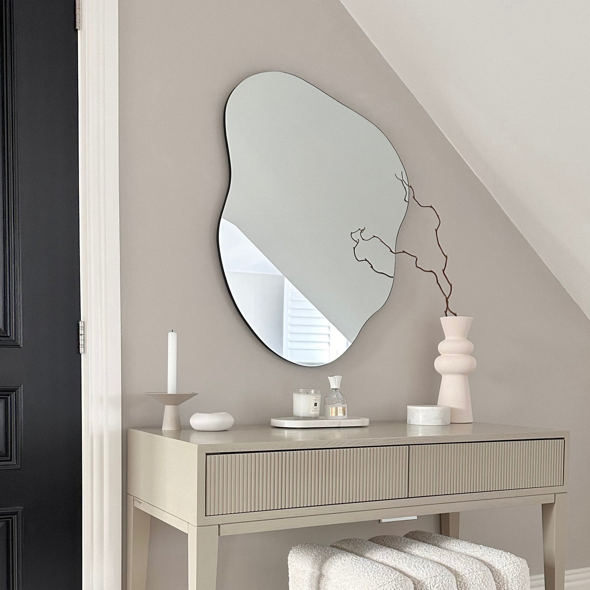 Small Frameless Pond Mirror displayed vertically above console table