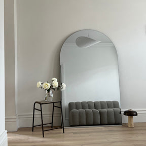 Extra large frameless arched full length mirror in lounge