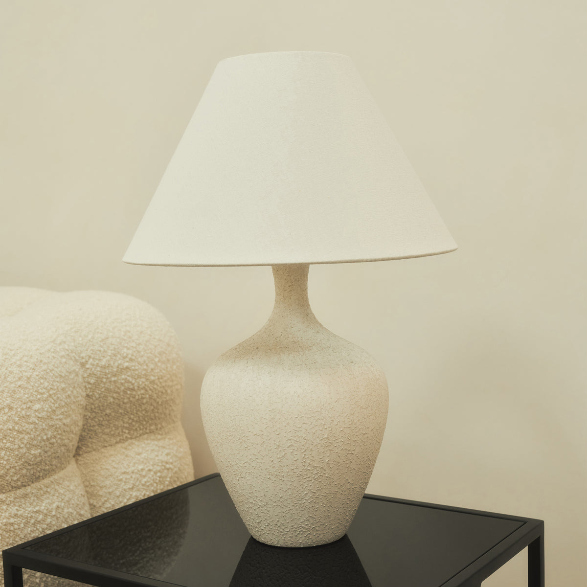 Textured Ceramic Based Table Lamp Natural Shade atop brooklyn table