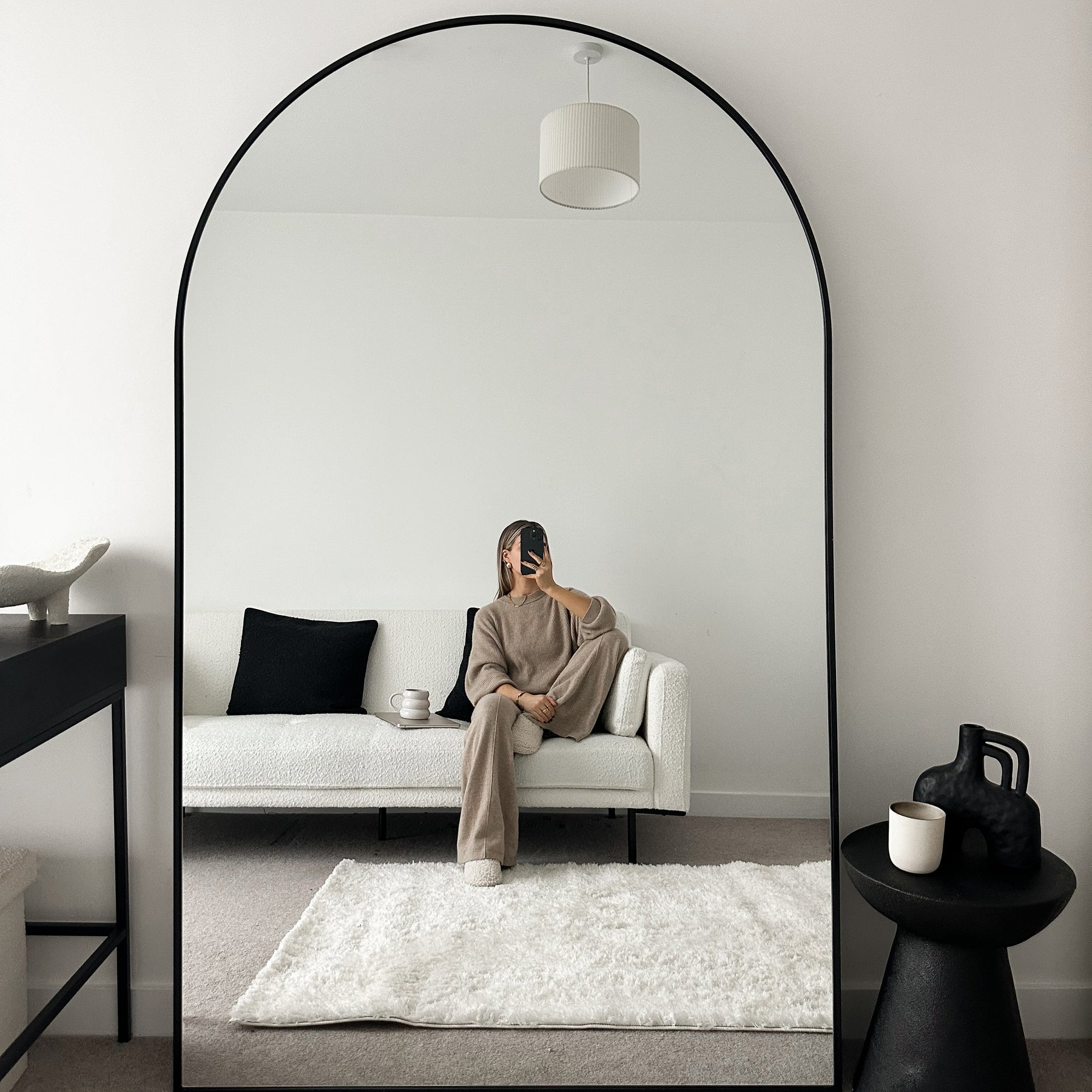 Black Full Length Arched Metal Mirror as living room lean to