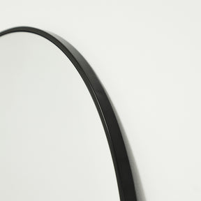 Black Full Length Arched Metal Mirror detail shot of curved frame