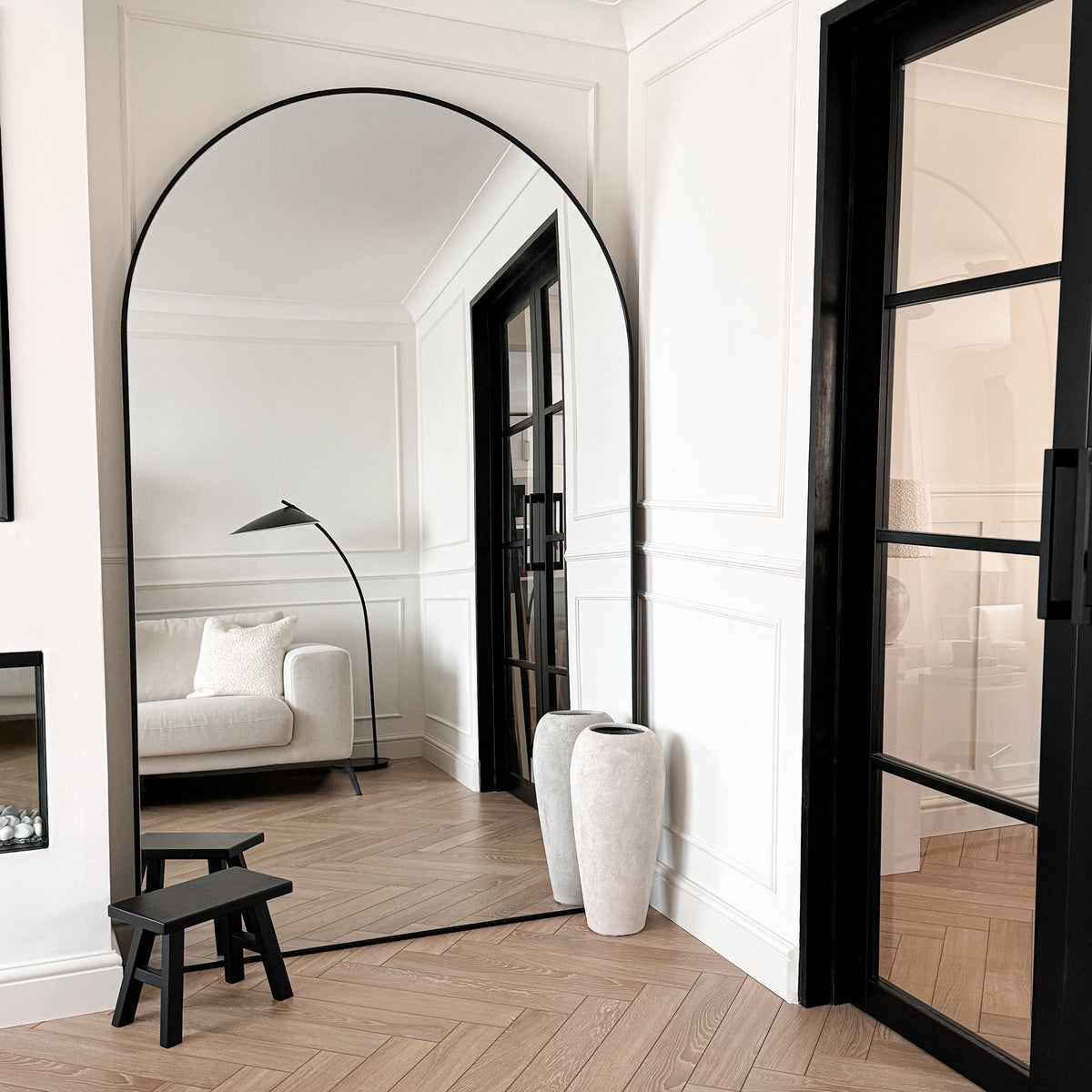 Black Full Length Arched Metal Mirror as living room lean to