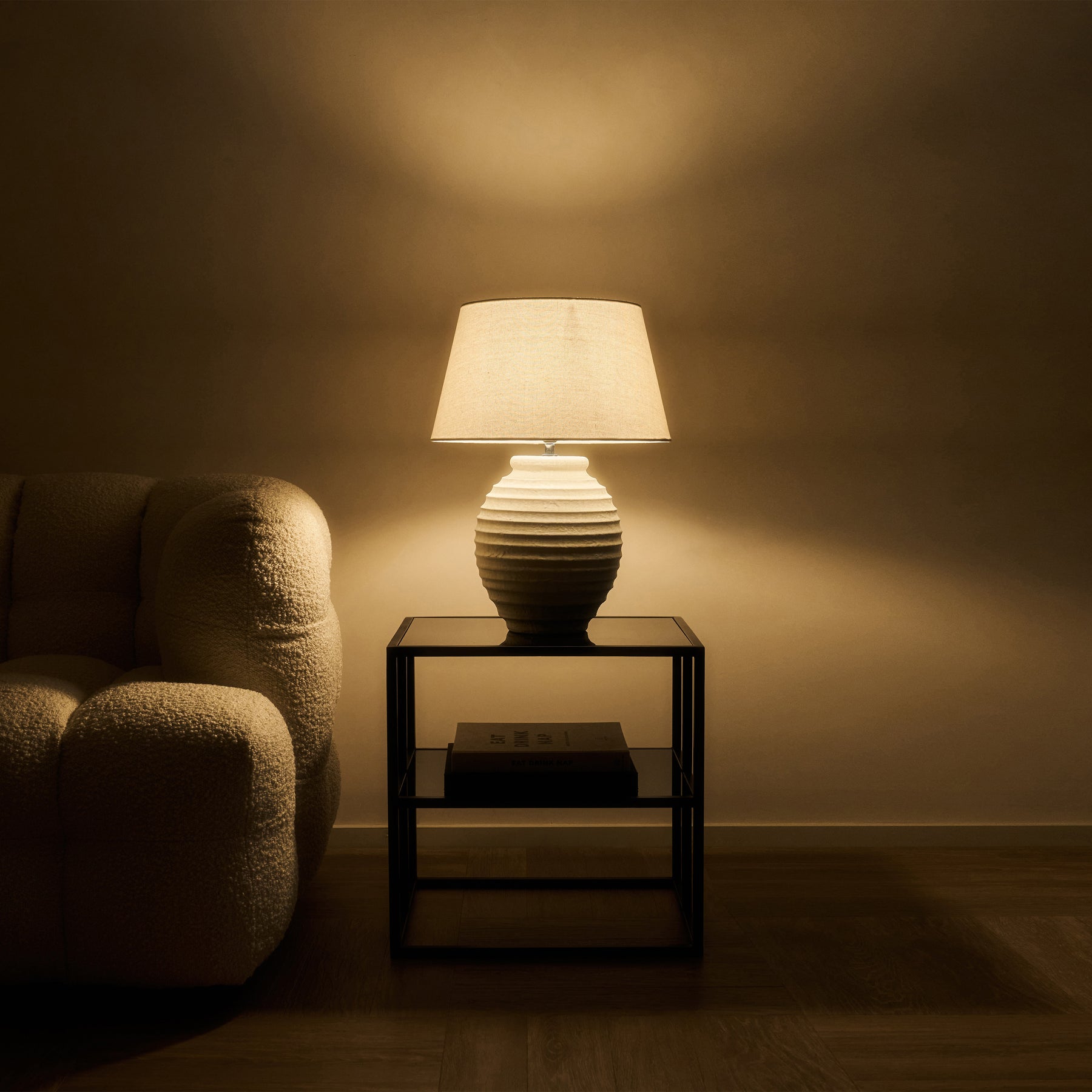 Textured Ceramic Based Table Lamp Natural Shade emitting warm light