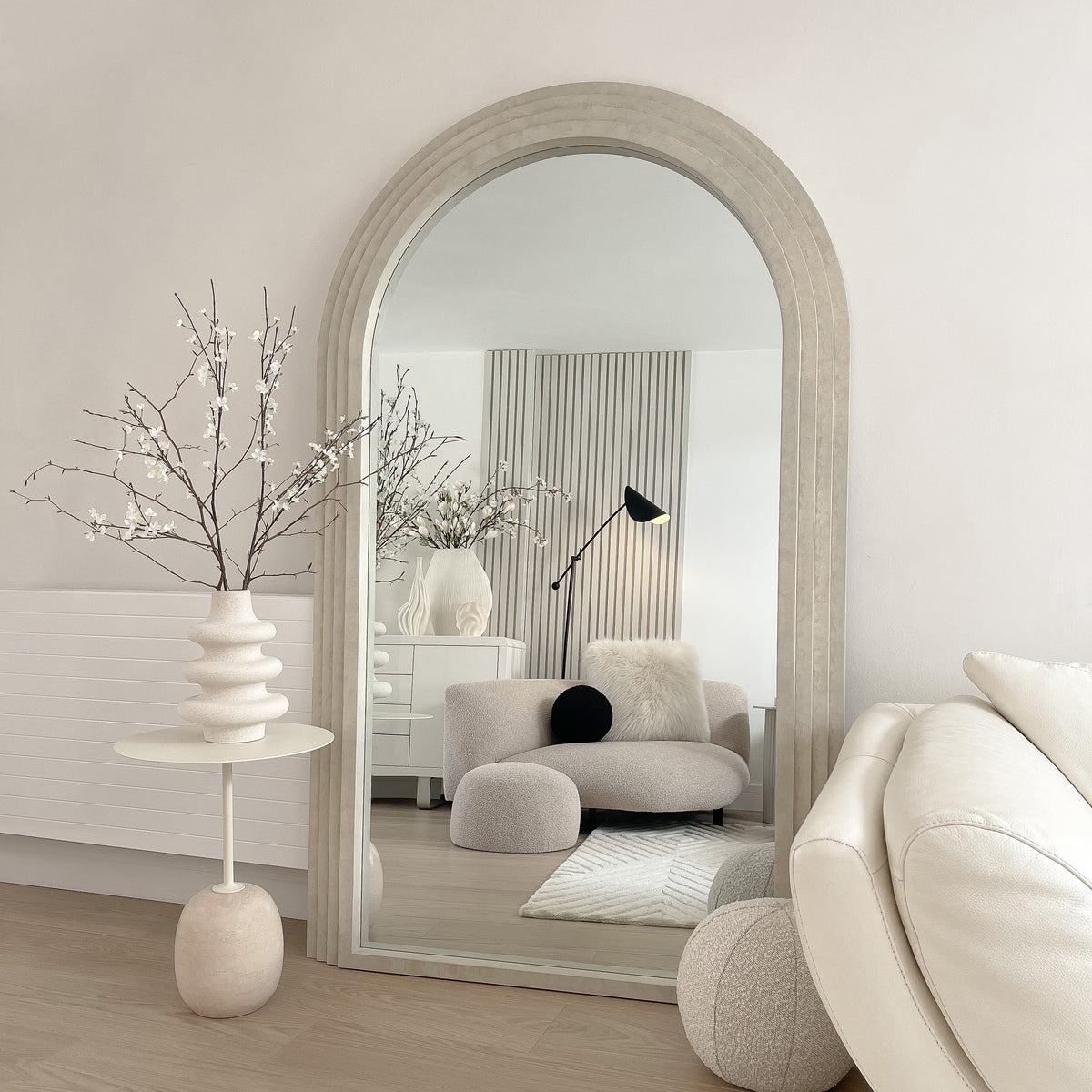 Full Length Arched Concrete Mirror in living room