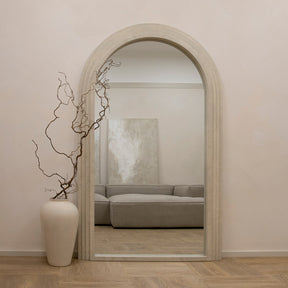 Full Length Arched Concrete Mirror opposite sofa