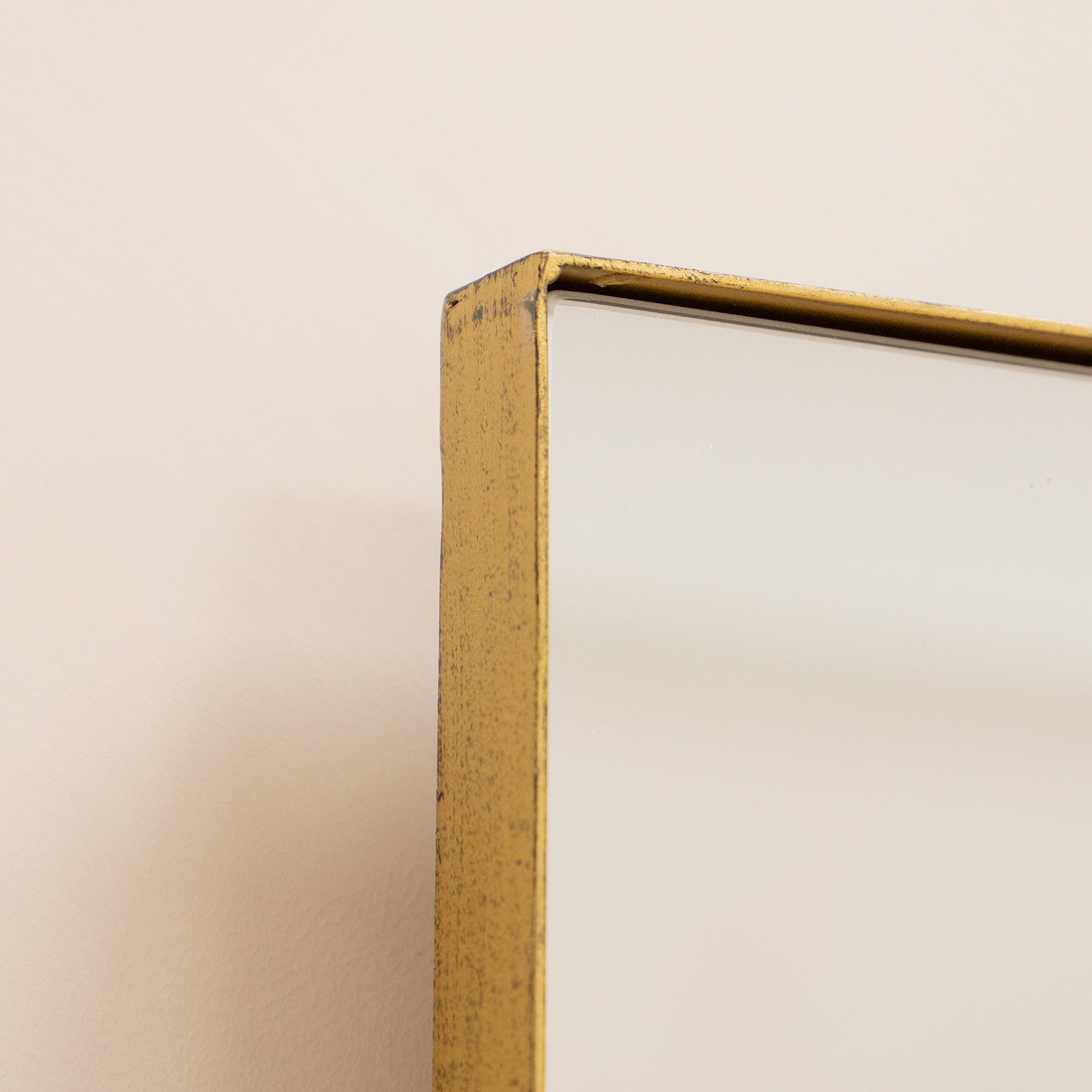 Detail shot of Gold Rectangular Metal Large Wall Mirror top corner