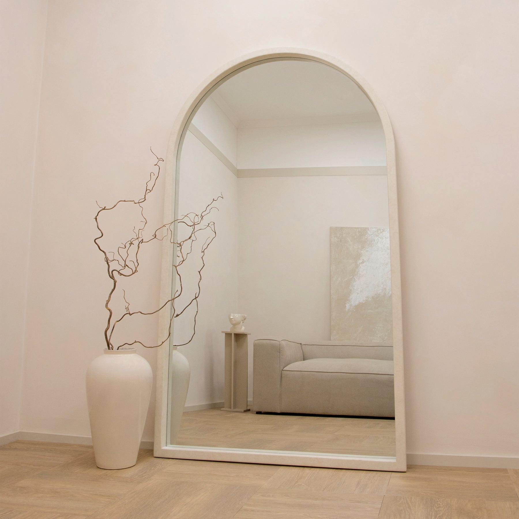 Full Length Extra Large Arched Concrete Mirror opposite sofa