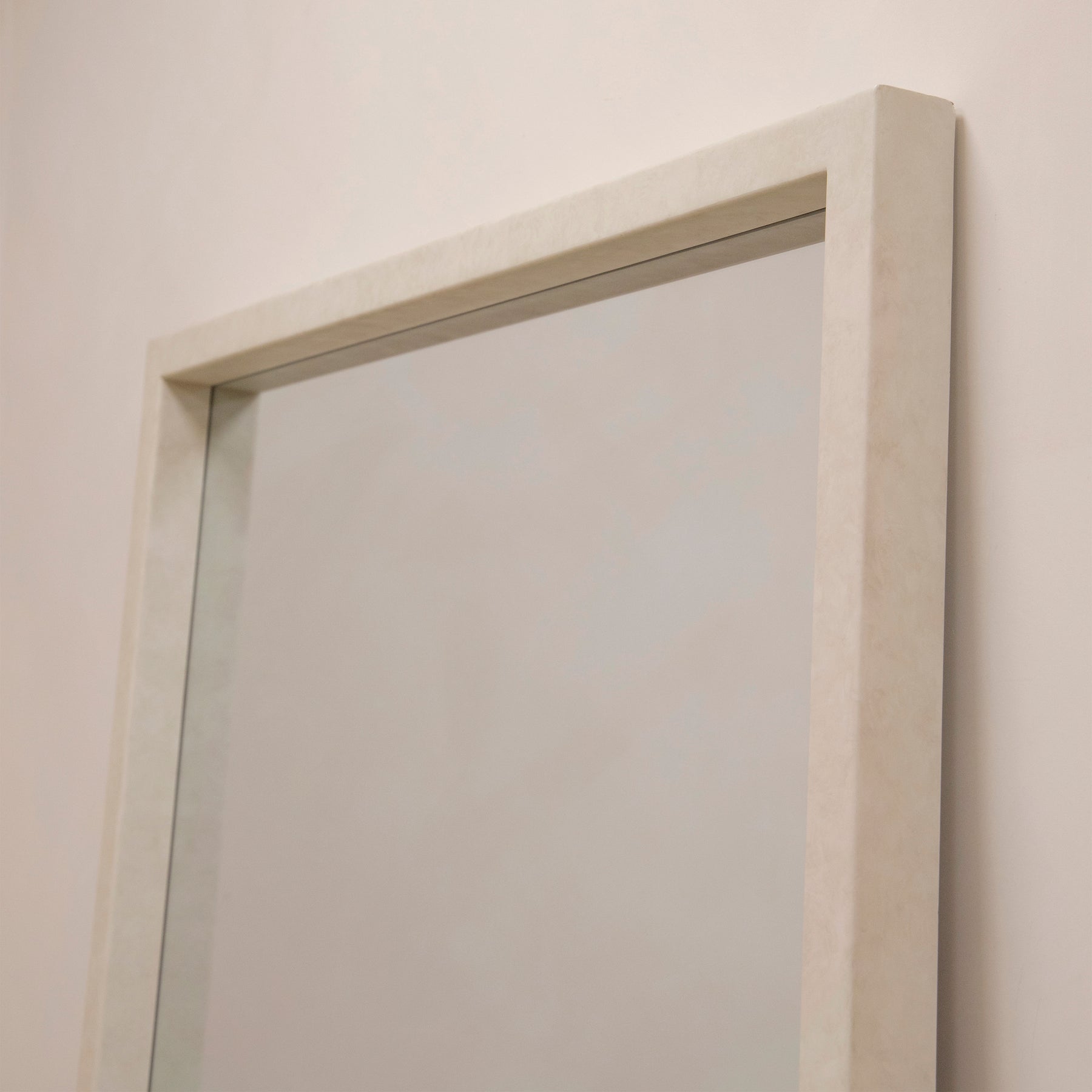 Wide shot of Full Length Extra Large Rectangular Concrete Mirror top portion