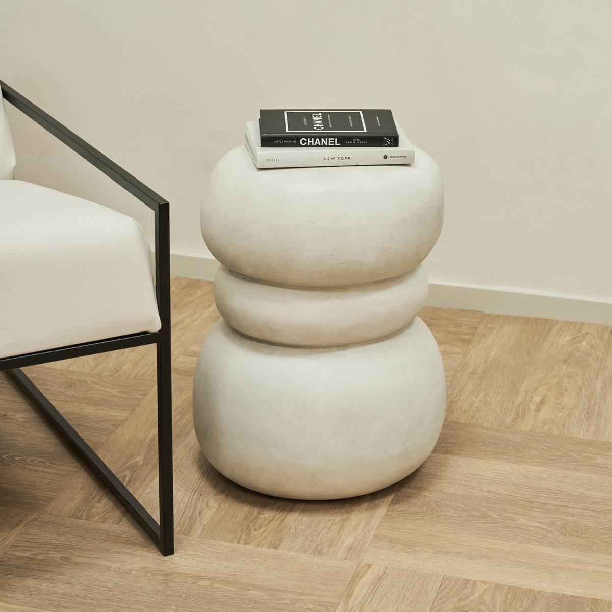 Minimal Concrete Side Table adorned with books
