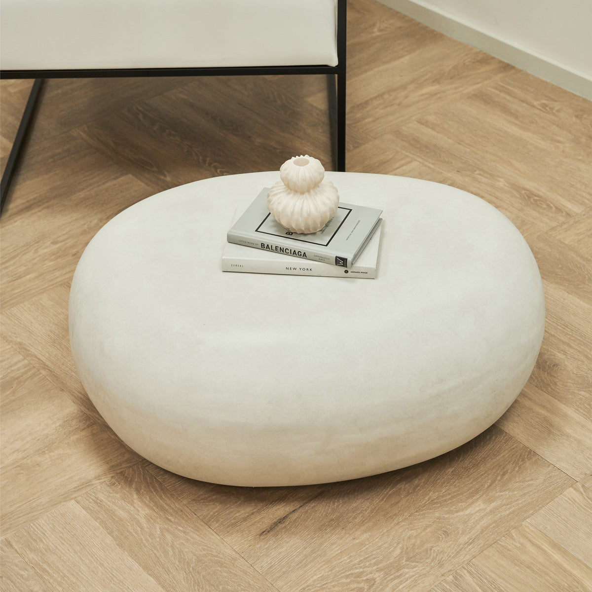 Minimal Concrete Pebble Coffee Table Large adorned with books