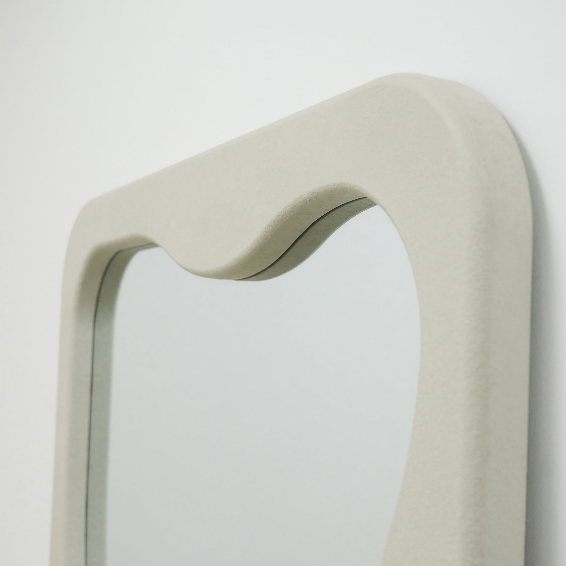 Full Length Irregular Concrete Mirror detail shot of irregular mirror frame top