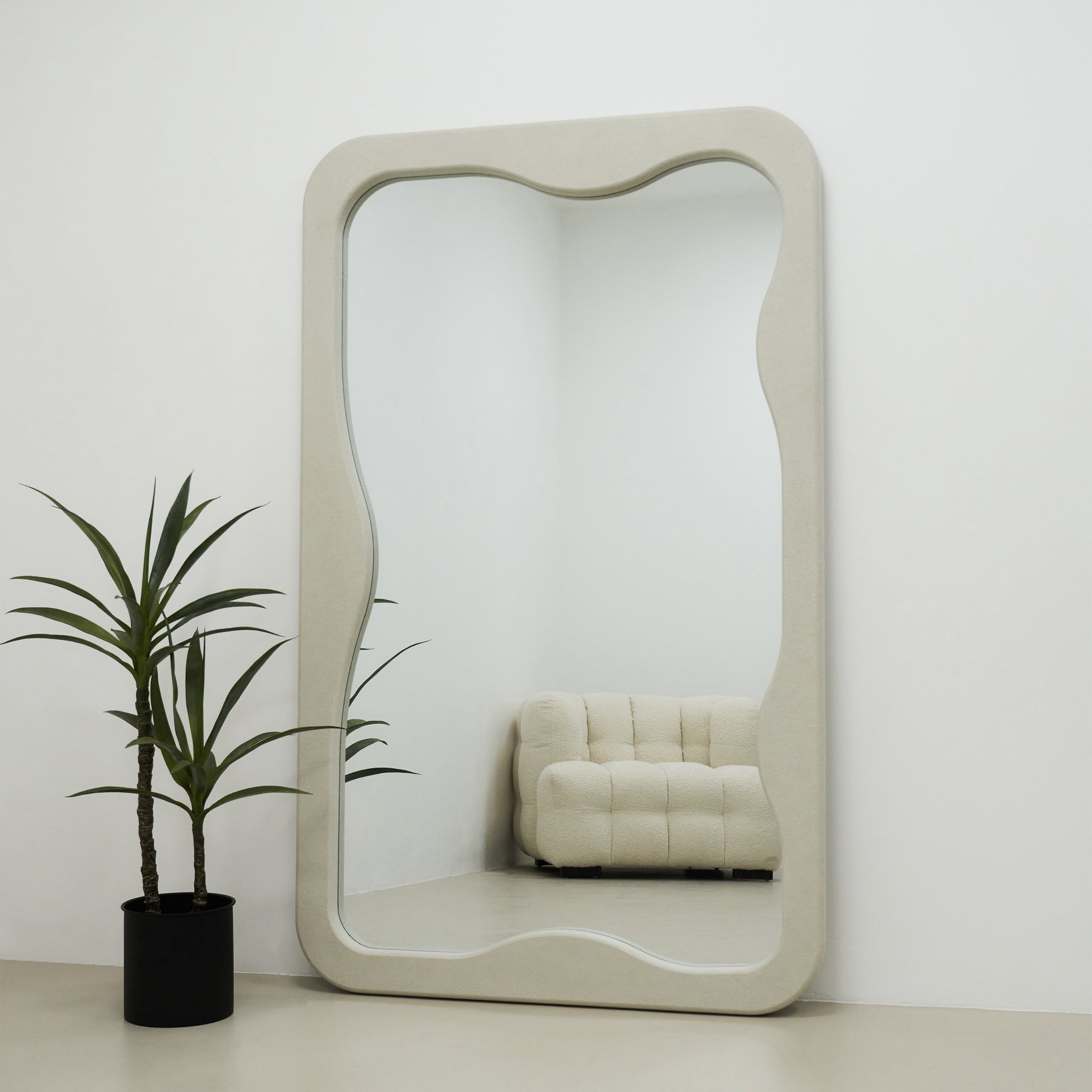 Full Length Irregular Concrete Mirror lighting up room