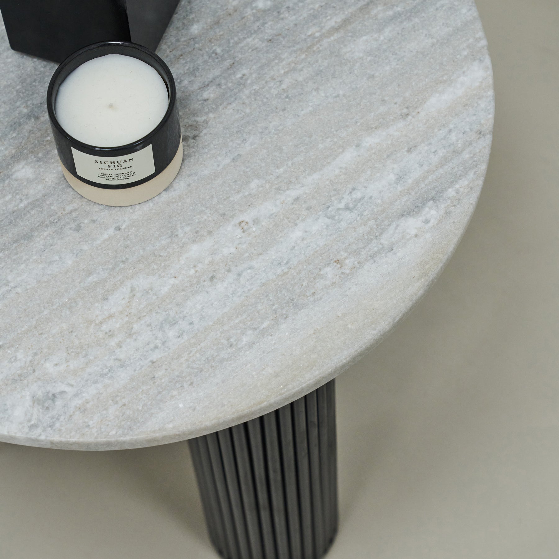 Closeup of Travertine round side table