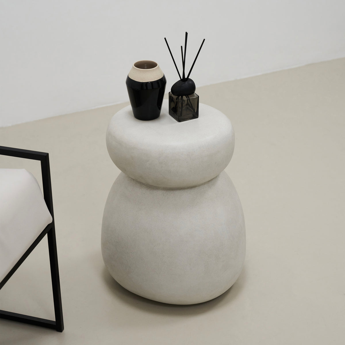 Minimal Concrete Side Table decorated with ceramic and incense
