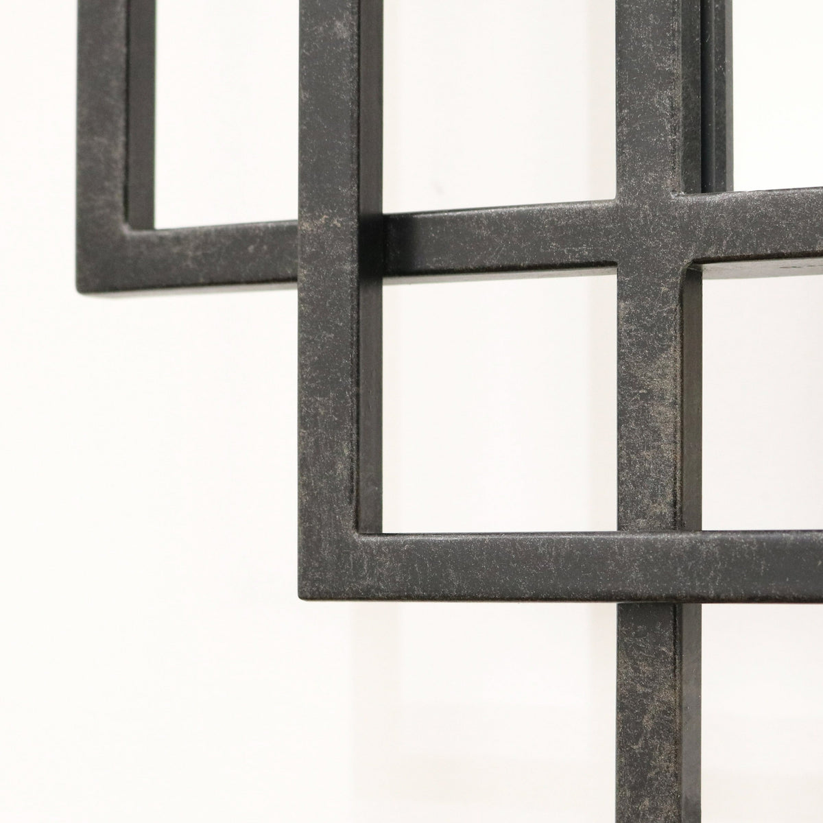 Closeup of Large black rectangular metal mirror