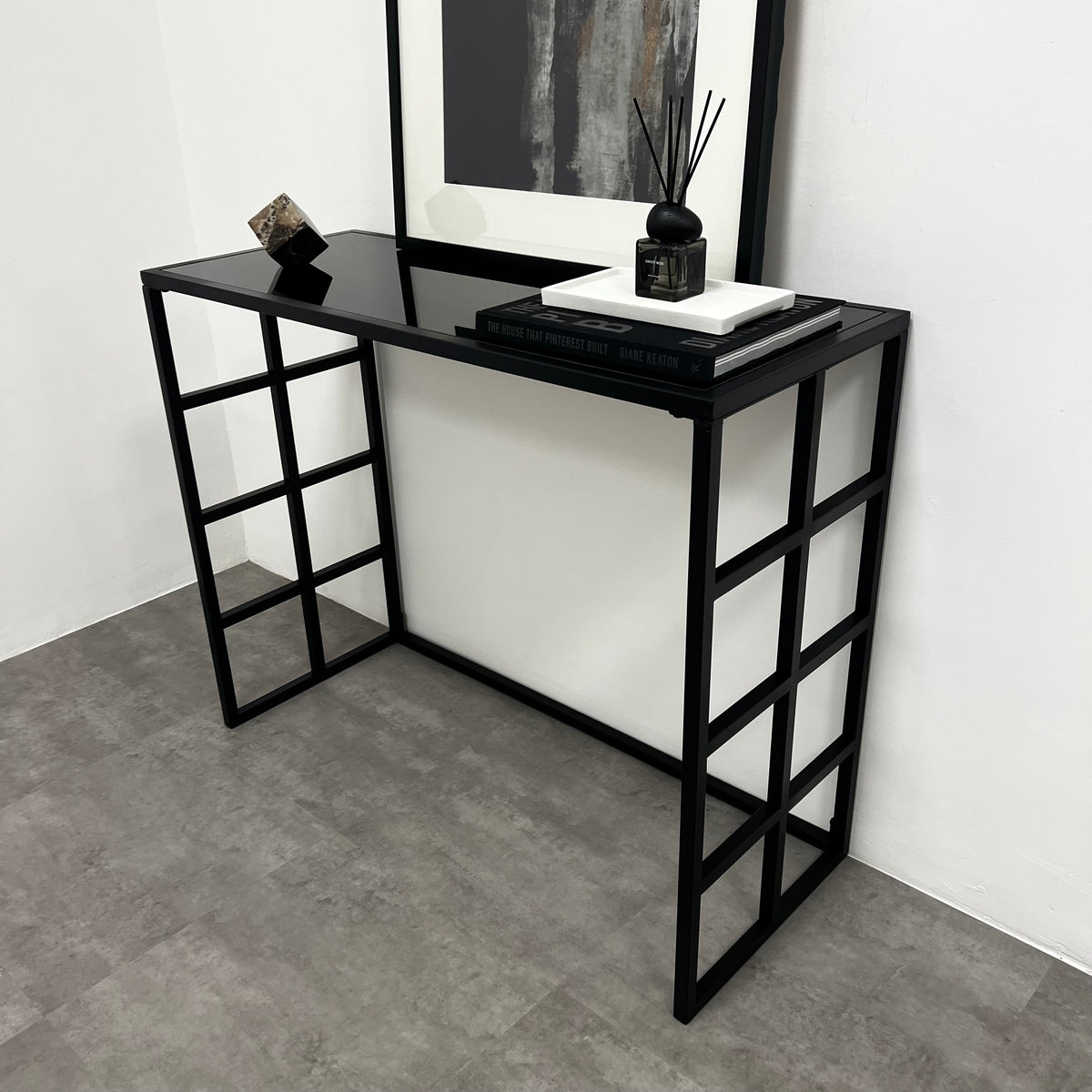 Black modern large rectangle tinted mirrored console table with painting and ornaments