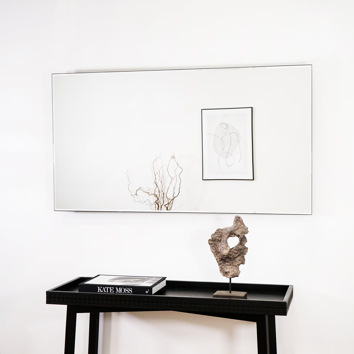 Large Frameless Rectangular Console Mirror above console table, reflecting painting