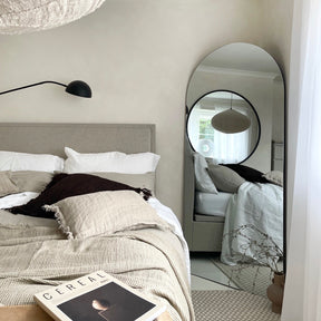 Large Frameless Arched Full Length Mirror beside bed