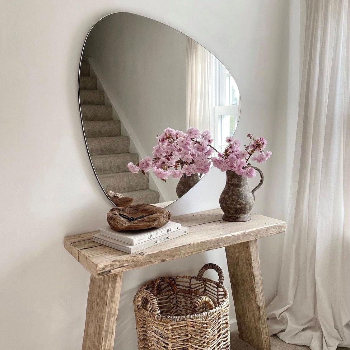 Large Frameless Pebble Wall Mirror above console table