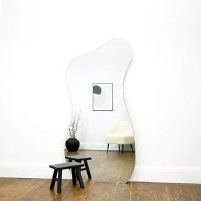 Large Frameless Full Length Pond Mirror beside stool