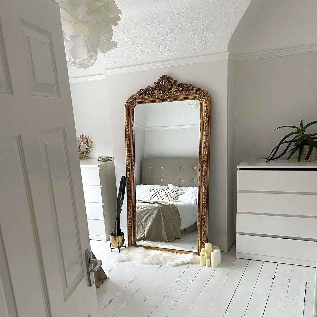 Full Length Gold Ornate Mirror as lean to in bedroom