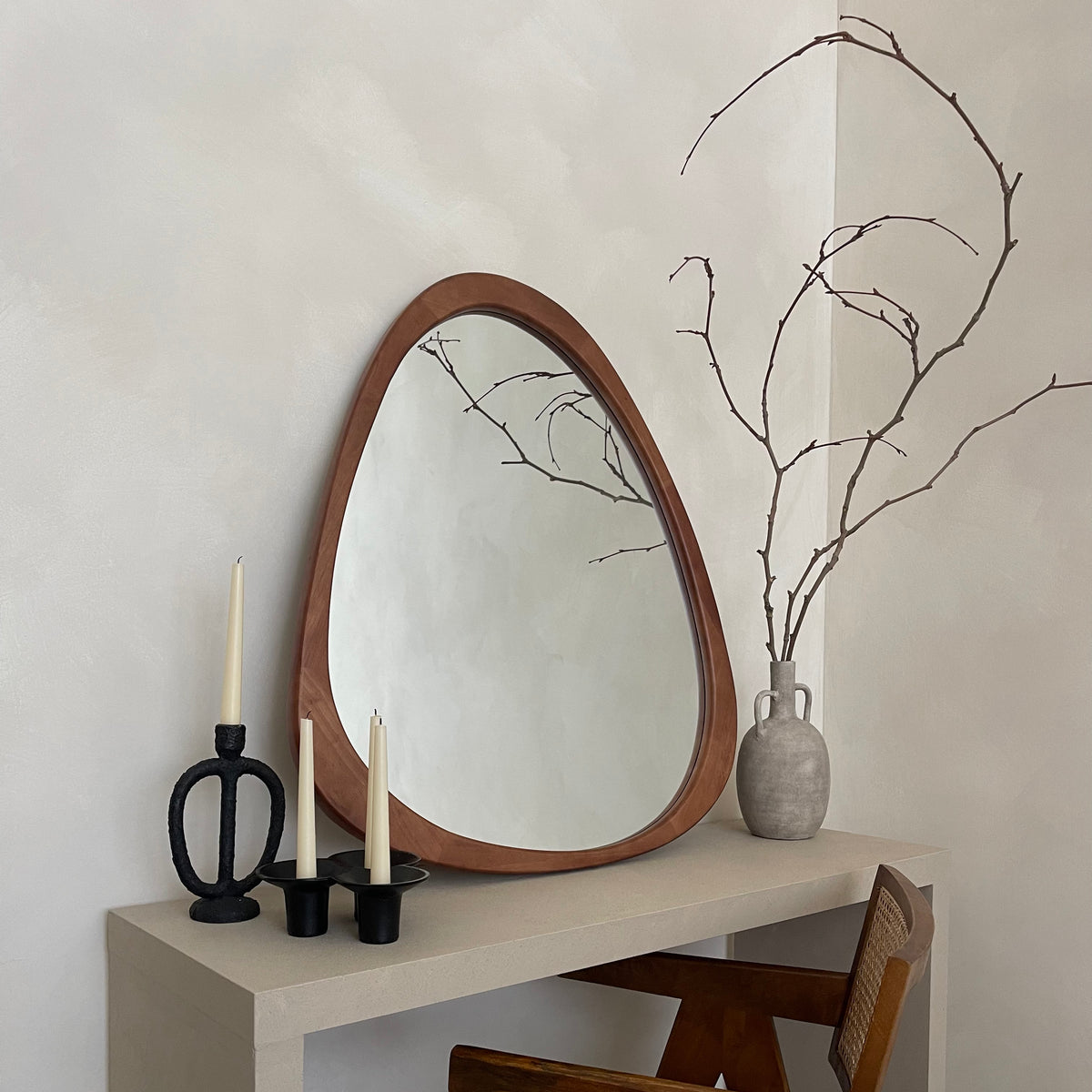 Walnut Organic Irregular Wooden Wall Mirror leaning against wall