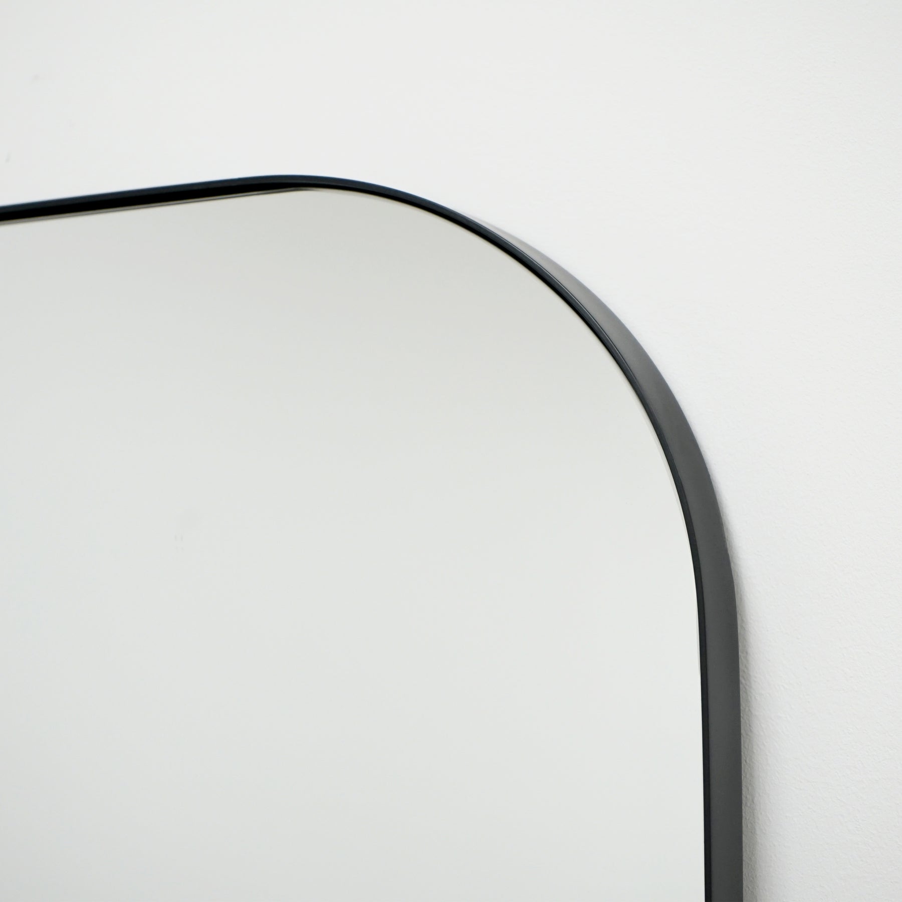 detail shot of Full Length Black Curved Metal Extra Large Mirror arch