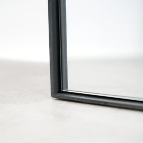 Detail shot of Full Length Black Curved Large Metal Mirror corner