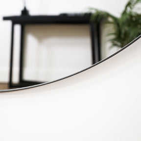 Detail shot of Black Round Metal Extra Large Wall Mirror curve