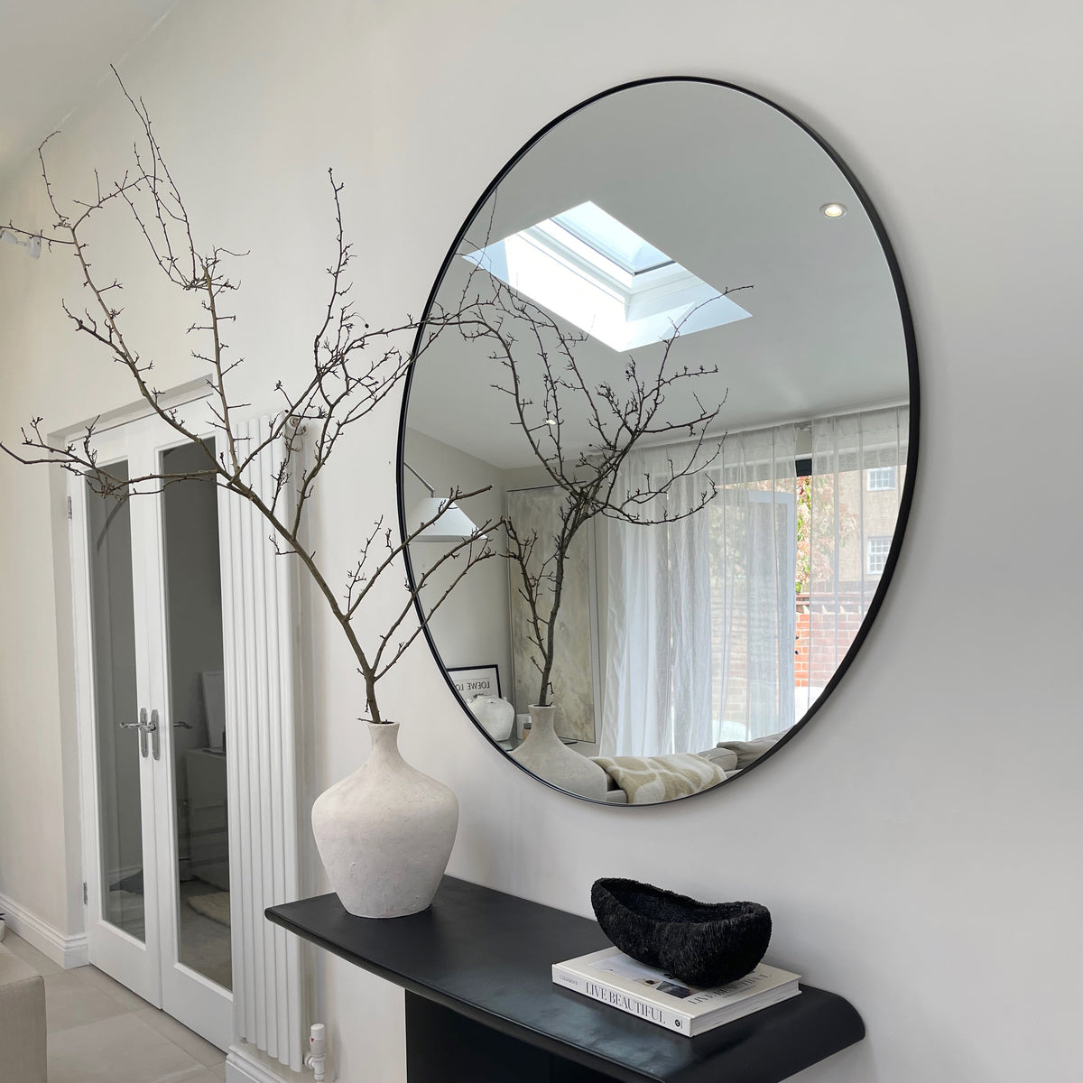 Black Round Metal Extra Large Wall Mirror above console table