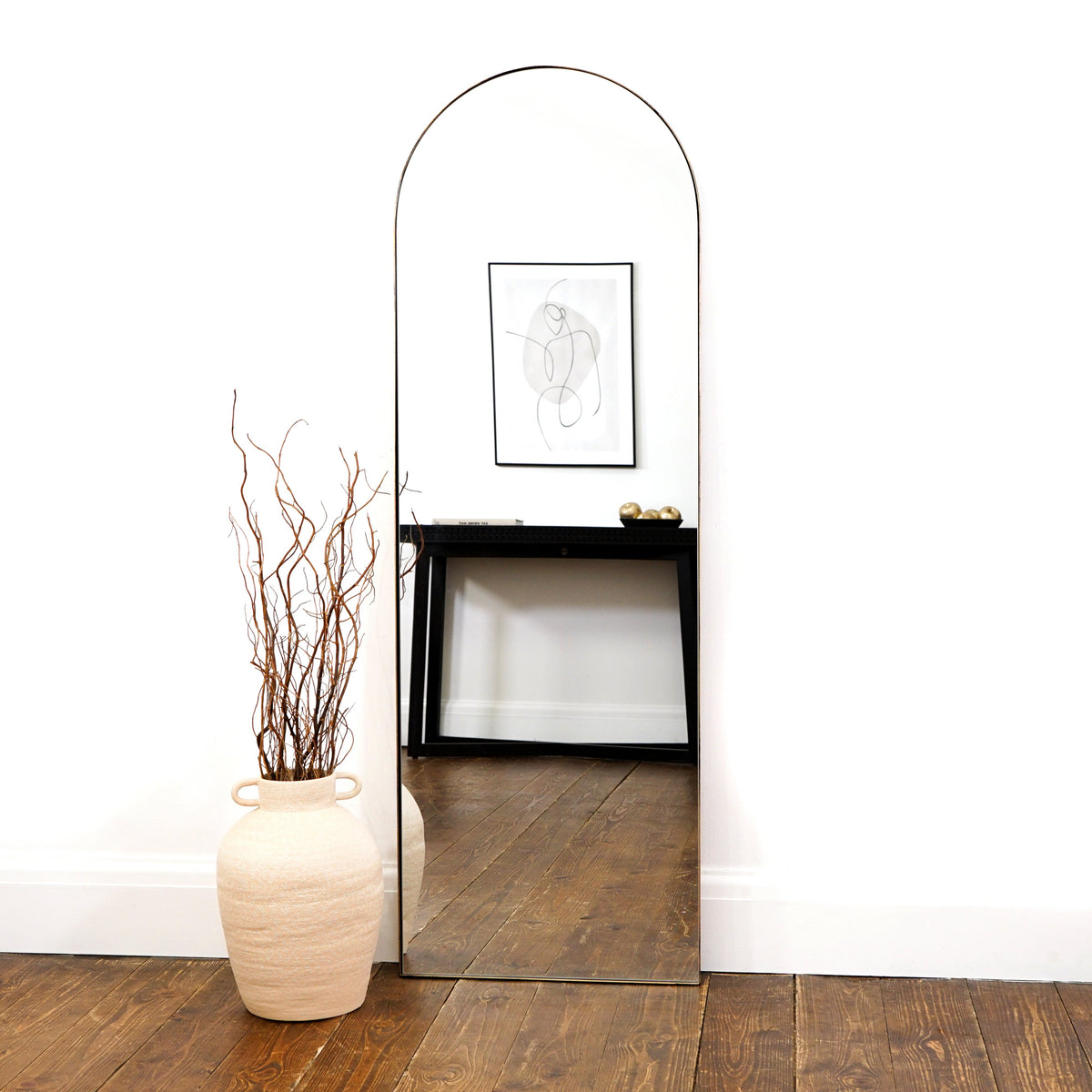 Full Length Gold Arched Large Metal Mirror as a living room lean to