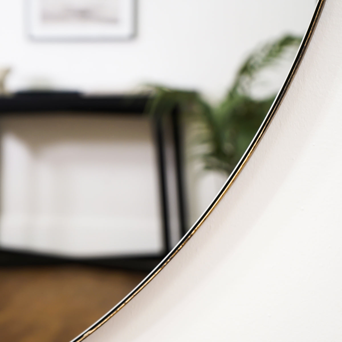 Detail shot of Gold Round Metal Extra Large Wall Mirror curved frame