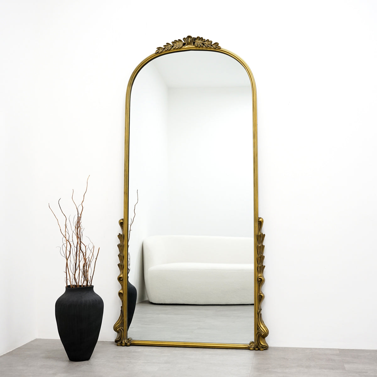 Full Length Gold Arched Ornate Metal Mirror in lounge
