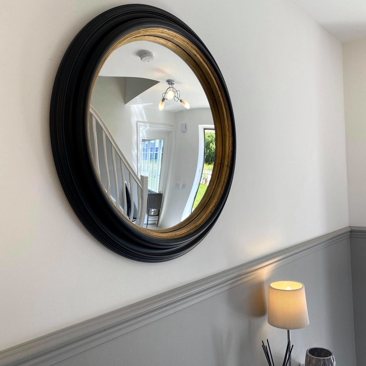 Black and gold porthole fish eye round mirror