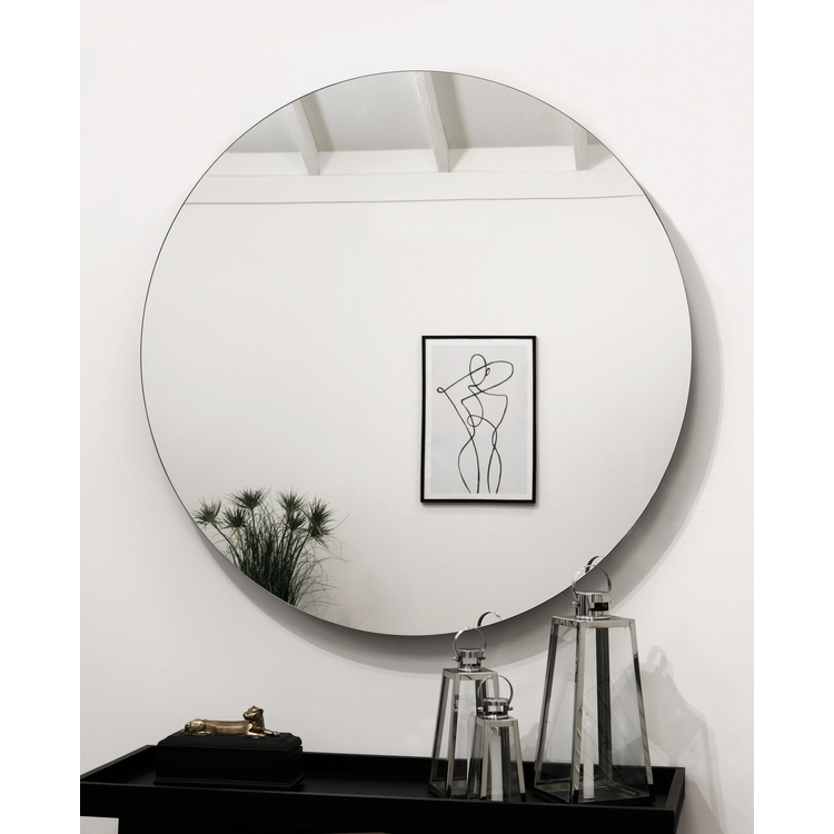 Large Frameless Round Wall Mirror reflecting painting