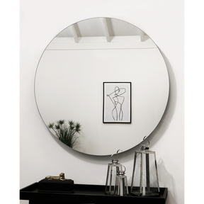 Small Frameless Round Wall Mirror above console table