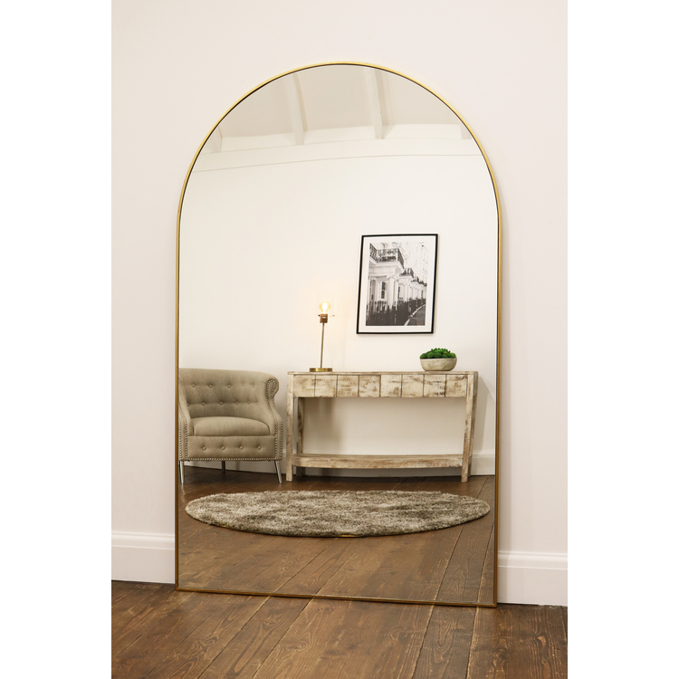 Gold Full Length Arched Metal Mirror as a lounge lean to