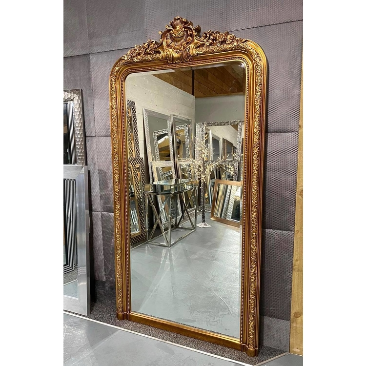 Full Length Gold Ornate Mirror standing out among other mirrrors